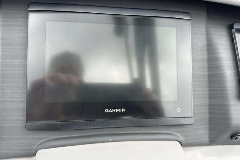 Slide: The Image of Garmin display on 2024 Bennington LX Sport Line dashboard. - 24