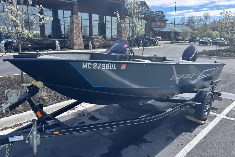 The Image of 2019 Starweld Fusion Pro 16 SC boat on trailer in parking lot. - 0