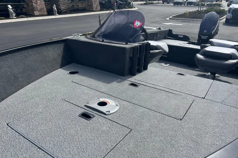 Slide: The Image of 2019 Starweld Fusion Pro 16 SC boat interior with seating and storage compartments. - 17