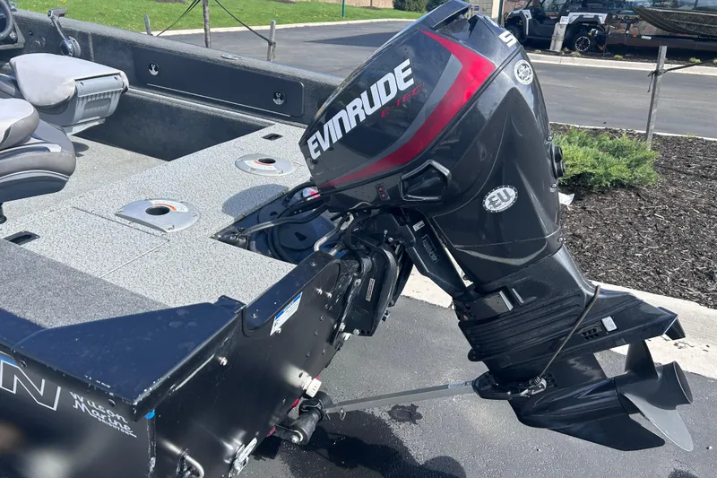 Slide: The Image of 2019 Starweld Fusion Pro 16 SC boat with Evinrude outboard motor, parked outdoors. - 3