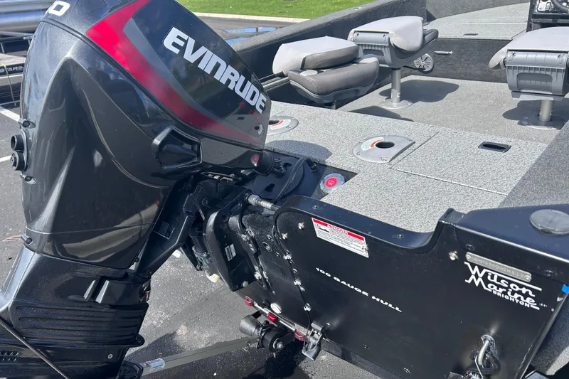 Slide: The Image of Starweld Fusion Pro 16 SC 2019 boat with Evinrude outboard motor, featuring spacious seating. - 5