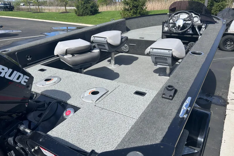Slide: The Image of 2019 Starweld Fusion Pro 16 SC boat interior with seating and steering console. - 6