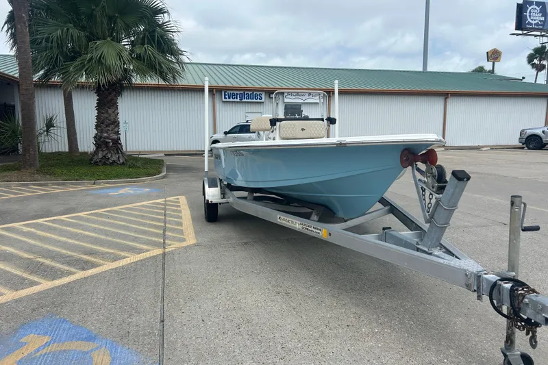 Slide: The Image of 2022 Sea Pro 172 Bay boat on trailer in parking lot near Everglades building. - 3