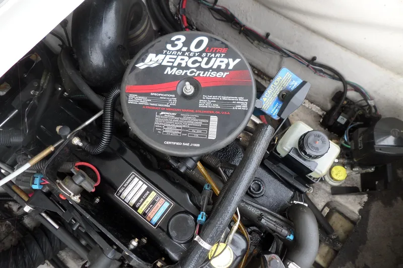 Slide: The Image of Engine compartment of a 2005 Tahoe Q4 Sport with Mercury MerCruiser 3.0L engine. - 27