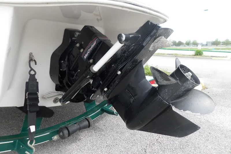 Slide: The Image of 2005 Tahoe Q4 Sport boat with MerCruiser outboard motor and propeller. - 7