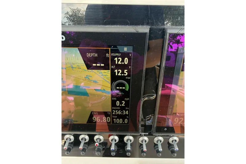 Slide: The Image of Dashboard of a 2021 Sea Born LX24 Center Console boat displaying navigation data. - 7