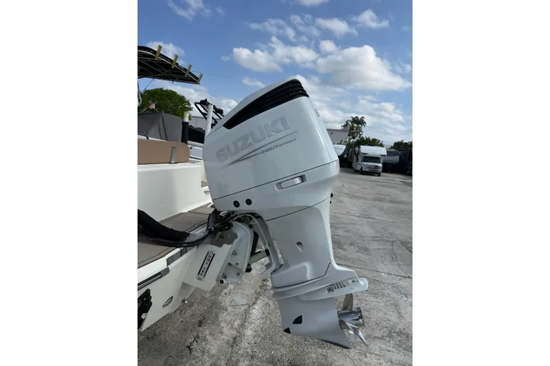 Slide: The Image of 2021 Sea Born LX24 Center Console with Suzuki outboard motor. - 9
