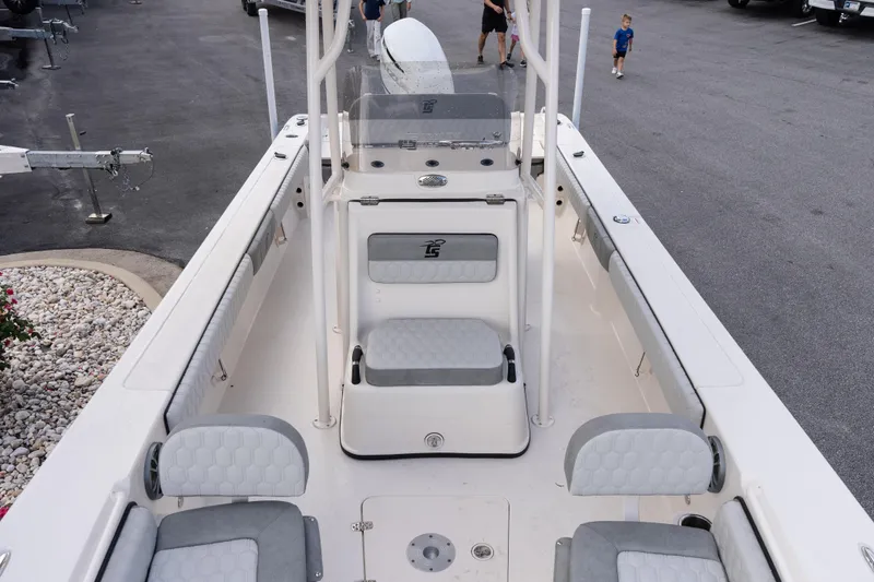 Slide: The Image of 2026 Carolina Skiff 24 Ultra Elite boat interior with seating and console. - 10