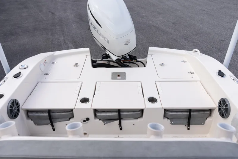 Slide: The Image of 2026 Carolina Skiff 24 Ultra Elite boat deck with Suzuki outboard motor. - 12