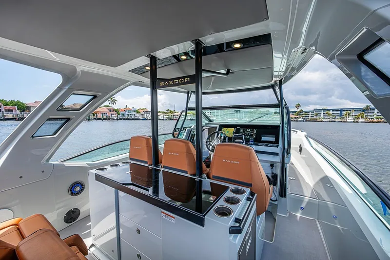 Slide: The Image of 2023 Saxdor 320 GTO luxury boat interior with modern design and waterfront view. - 26