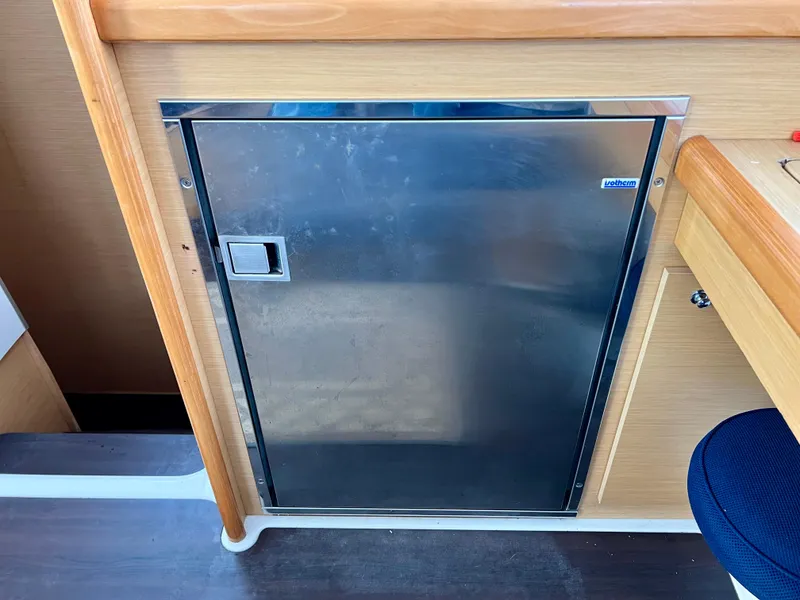 Slide: The Image of Stainless steel refrigerator door on 2008 Lagoon 420 yacht interior. - 19