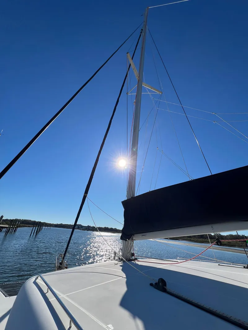 Slide: The Image of 2008 Lagoon 420 catamaran sailing under sunny skies. - 39