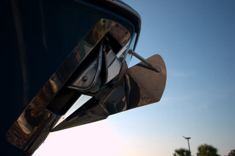 Slide: The Image of Close-up of a 2015 Pursuit ST 310 Sport boat propeller against a clear sky. - 30