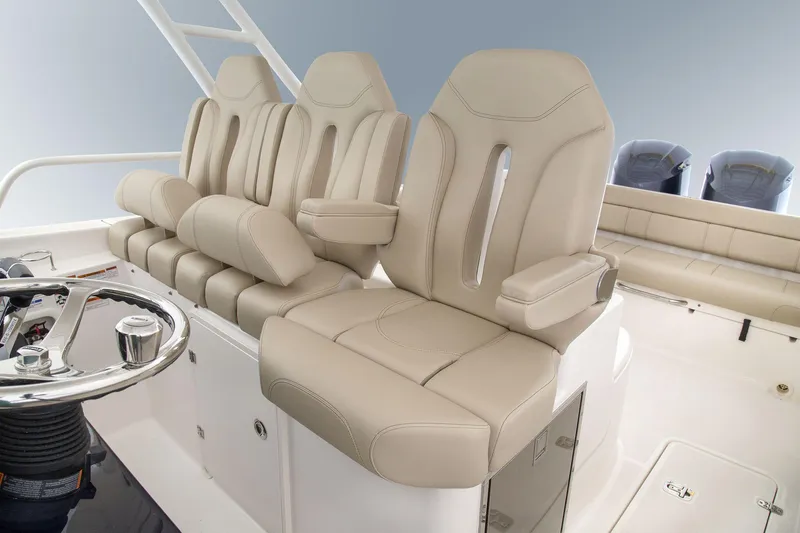 Slide: The Image of Manufacturer Provided Image: 2015 Pursuit ST 310 Sport boat cruising on the ocean. - 18