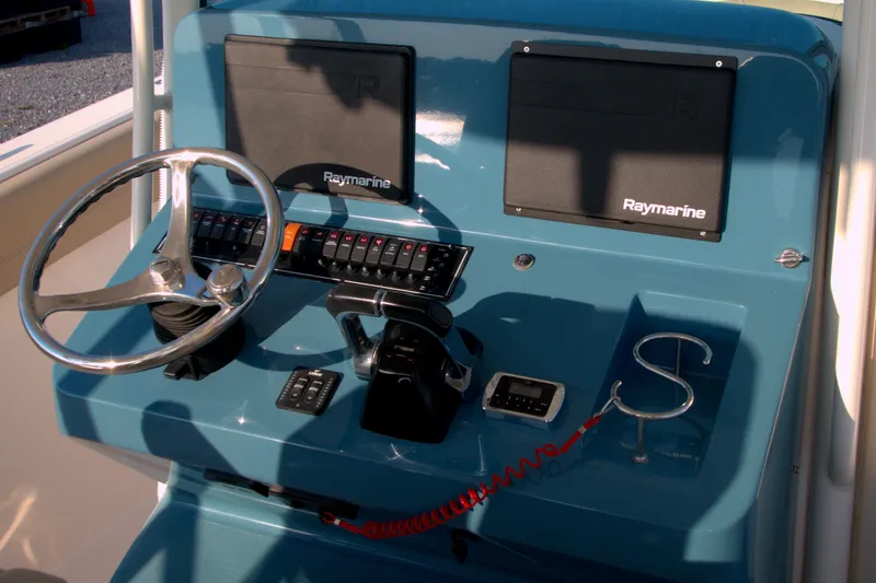 Slide: The Image of Control panel of 2015 Pursuit ST 310 Sport boat with Raymarine displays. - 38