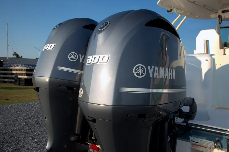 Slide: The Image of Twin Yamaha 300 outboard engines on a 2015 Pursuit ST 310 Sport boat. - 27