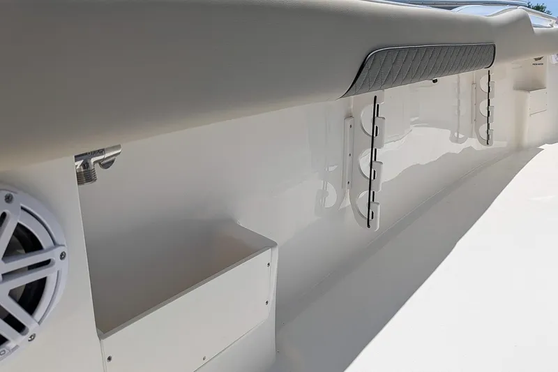 Slide: The Image of Interior view of 2026 Key West 249 FS boat, featuring sleek design and integrated speaker. - 13