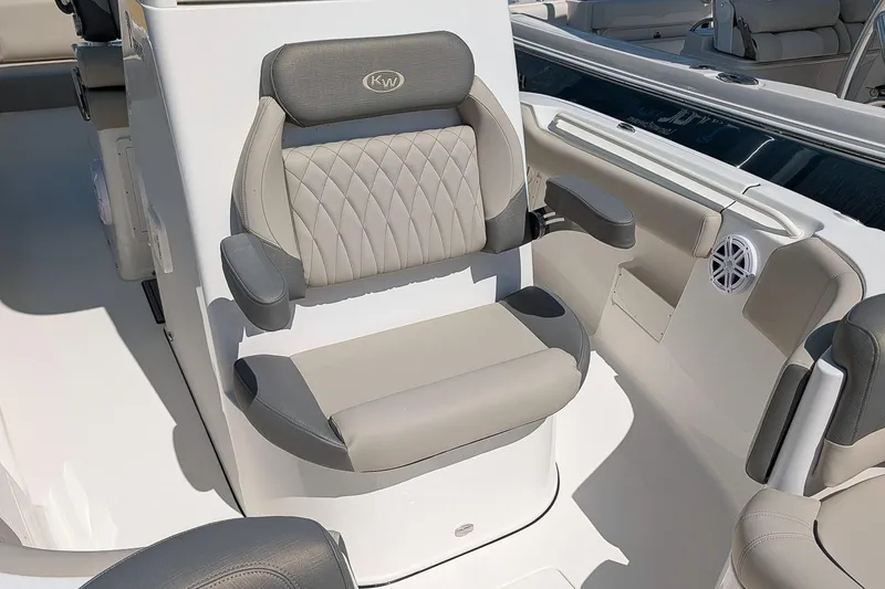 Slide: The Image of 2026 Key West 249 FS boat seat with gray upholstery and armrests. - 21
