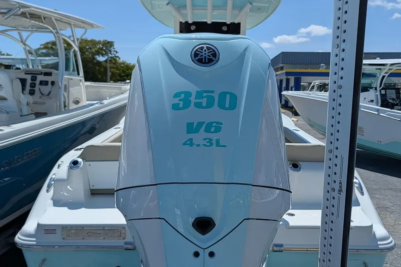 Slide: The Image of Outboard motor on a 2026 Key West 249 FS boat, featuring 350 V6 4.3L engine. - 4