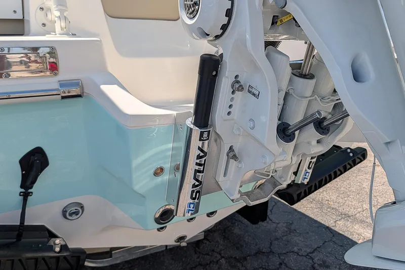 Slide: The Image of 2026 Key West 249 FS boat engine detail with hydraulic components and sleek design. - 5