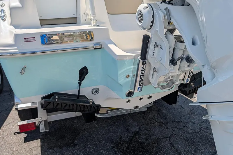 Slide: The Image of 2026 Key West 249 FS boat stern with Atlas hydraulic jack plate and outboard motor. - 6