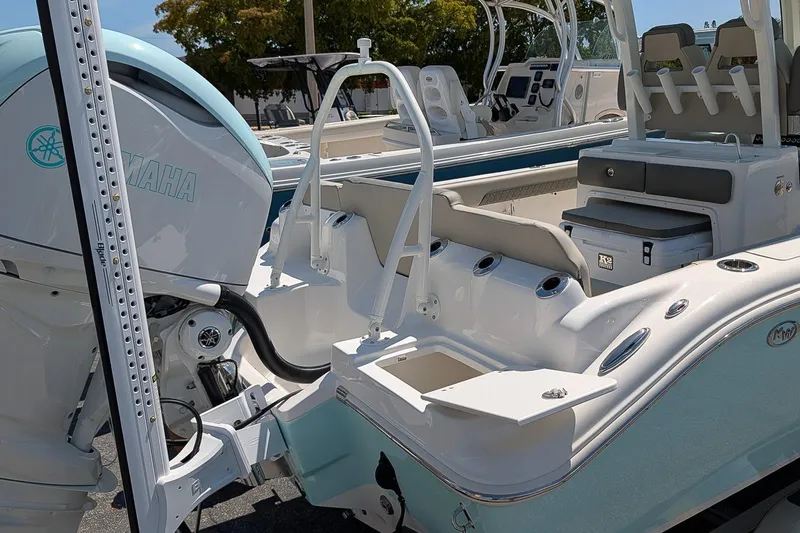Slide: The Image of 2026 Key West 249 FS boat with Yamaha engine, featuring seating and storage compartments. - 9
