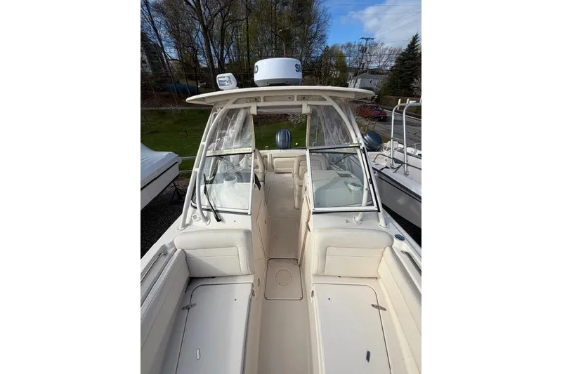 Slide: The Image of 2012 Grady-White Freedom 235 boat interior with seating and windshield. - 11