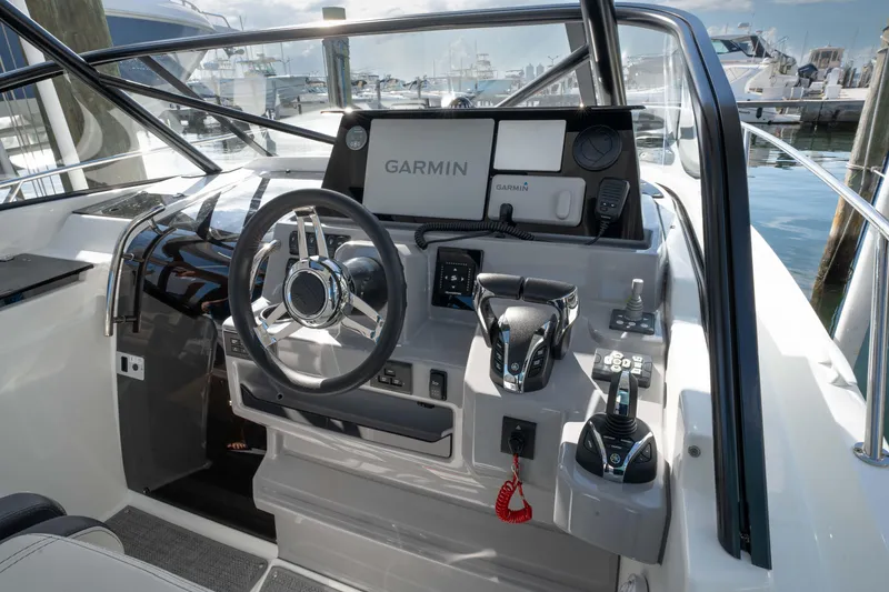 Slide: The Image of 2024 Jeanneau Leader 9.0 WA Series 2 helm with Garmin navigation system. - 15