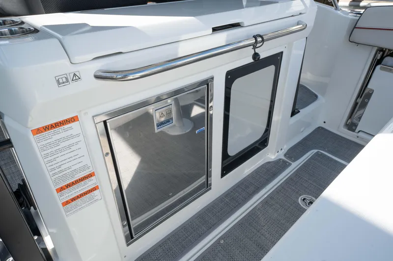 Slide: The Image of 2024 Jeanneau Leader 9.0 WA Series 2 boat interior with storage compartments. - 28