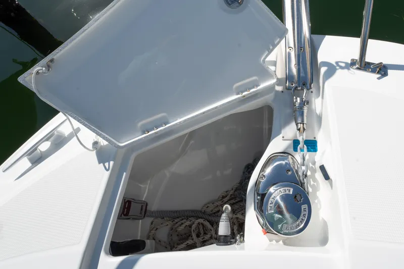 Slide: The Image of Anchor compartment of 2024 Jeanneau Leader 9.0 WA Series 2 boat, featuring winch and chain. - 34