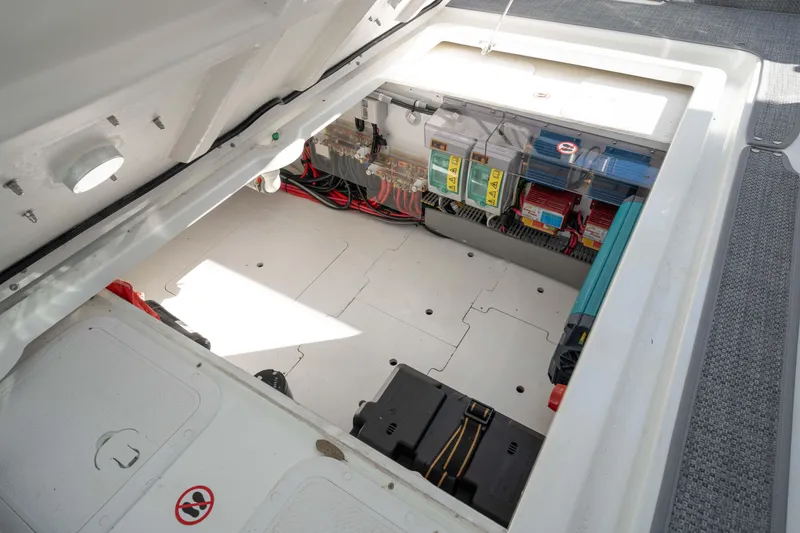 Slide: The Image of 2024 Jeanneau Leader 9.0 WA Series 2 engine compartment with electrical components. - 56