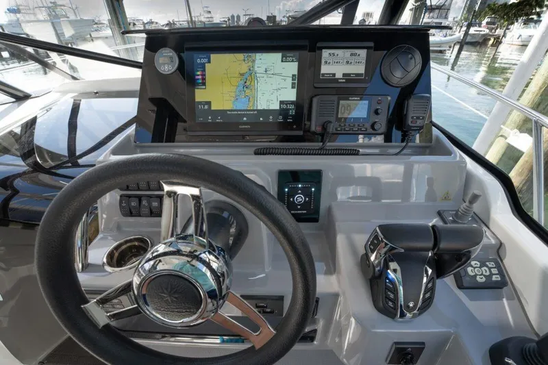 Slide: The Image of 2024 Jeanneau Leader 9.0 WA Series 2 helm with advanced navigation and control systems. - 7