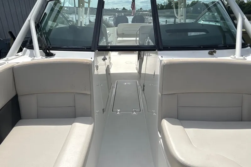 Slide: The Image of 2019 Boston Whaler 270 Vantage boat interior with seating and windshield. - 13