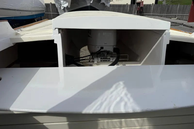 Slide: The Image of 2024 Hylan Bowler boat interior with visible engine compartment. - 24