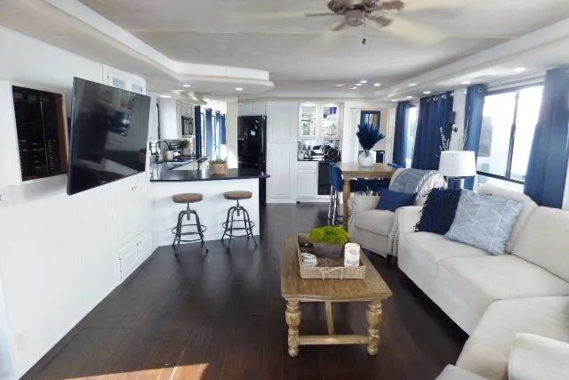 Slide: The Image of Luxurious 1997 Sumerset 16x80 houseboat interior with modern decor and spacious living area. - 2
