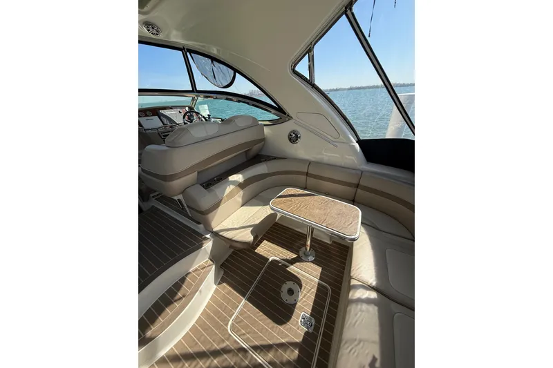 Slide: The Image of Interior of 2014 Formula 37 Performance Cruiser with elegant seating and table, overlooking water. - 10