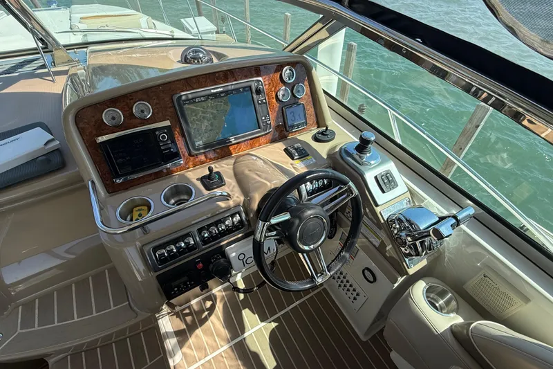 Slide: The Image of Cockpit of 2014 Formula 37 Performance Cruiser with navigation system and controls. - 19