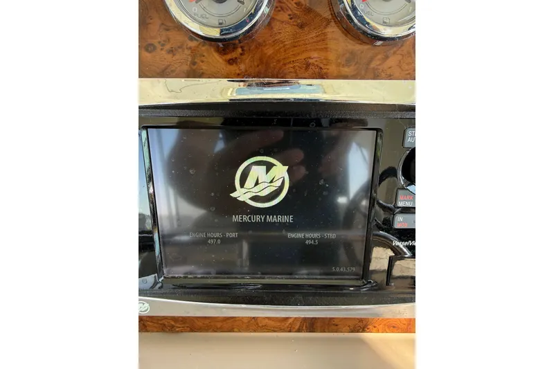 Slide: The Image of Dashboard of a 2014 Formula 37 Performance Cruiser showing Mercury Marine engine hours. - 20