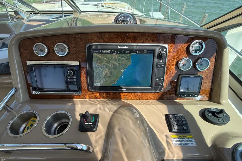 Slide: The Image of Dashboard of a 2014 Formula 37 Performance Cruiser with navigation and control instruments. - 21
