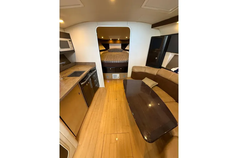 Slide: The Image of Interior of 2014 Formula 37 Performance Cruiser with kitchen and seating area. - 24