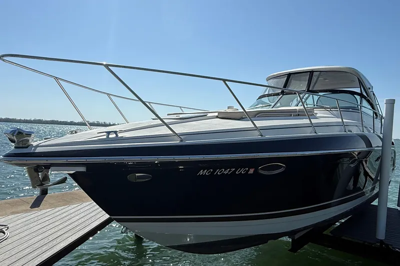 Slide: The Image of 2014 Formula 37 Performance Cruiser docked on a sunny day. - 3
