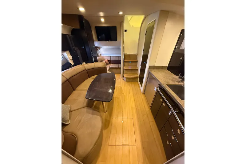 Slide: The Image of Luxurious interior of a 2014 Formula 37 Performance Cruiser with modern amenities and elegant design. - 37