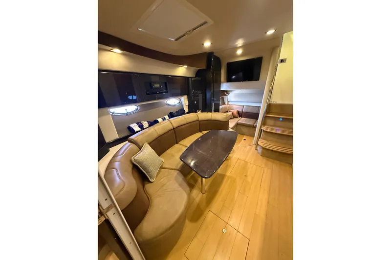 Slide: The Image of Luxurious interior of a 2014 Formula 37 Performance Cruiser with elegant seating and modern amenities. - 38