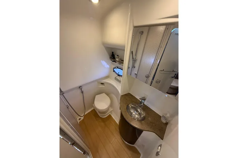 Slide: The Image of Bathroom interior of 2014 Formula 37 Performance Cruiser, featuring sink and toilet. - 41