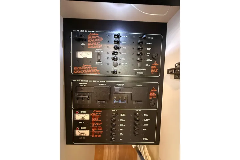 Slide: The Image of Electrical control panel on a 2014 Formula 37 Performance Cruiser boat. - 42