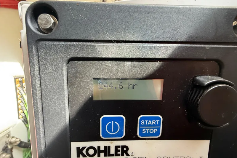 Slide: The Image of Kohler digital control panel displaying 244.6 hours on a Formula 37 Performance Cruiser, 2014 model. - 47