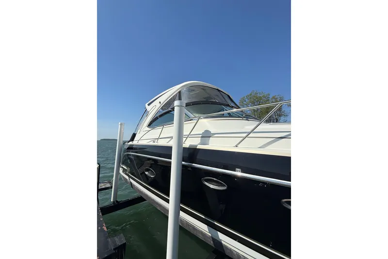 Slide: The Image of 2014 Formula 37 Performance Cruiser docked on a sunny day. - 5