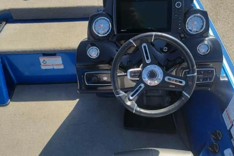Slide: The Image of Steering console of a 2019 Nitro Z20 Pro boat with gauges and controls. - 10