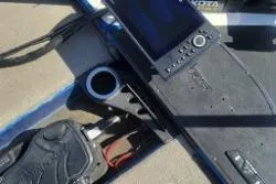 Slide: The Image of Control panel of a 2019 Nitro Z20 Pro boat with electronic display and cup holder. - 11