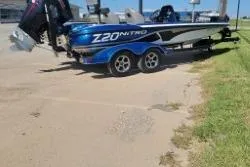 Slide: The Image of 2019 Nitro Z20 Pro boat on trailer, parked on a sunny day. - 12